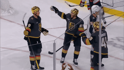 Hockey Player In Number 9 Jersey On Ice GIF