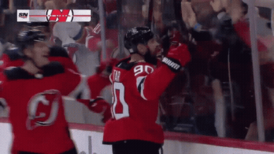 Hockey Player In Number 90 Jersey Celebrates Goal GIF