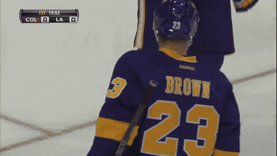Hockey Player In Purple Jersey Number 23 GIF