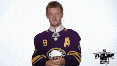 Hockey Player In Purple Jersey Number 9 GIF