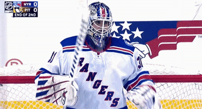 Hockey Player In Rangers Jersey Holding Stick GIF