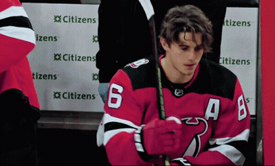 Hockey Player in Red and Black Jersey Number 6