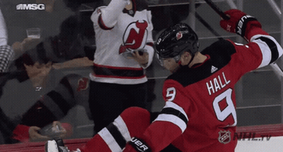 Hockey Player In Red And Black Uniform Hall GIF