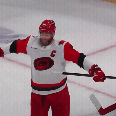 Hockey Player In Red And White Jersey With C GIF
