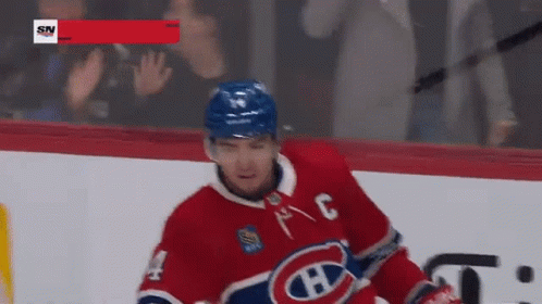 Hockey Player In Red And White Jersey With Number 4 GIF