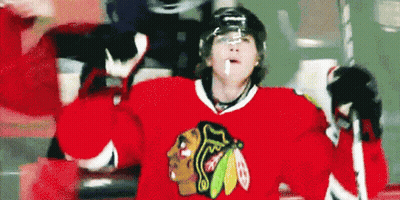 Hockey Player In Red Blackhawks Jersey GIF