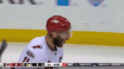 Hockey Player In Red Helmet GIF