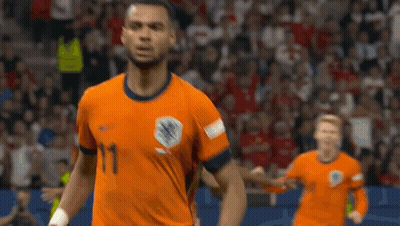 Hockey Player In Red Jersey Number 11 GIF