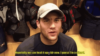 Hockey Player In Red Jersey Number 17 GIF