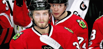 Hockey Player In Red Jersey Number 24 GIF