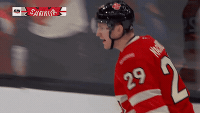 Hockey Player In Red Jersey Number 29 GIF