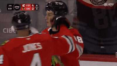 Hockey Player In Red Jersey Number 4 GIF