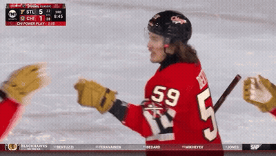 Hockey Player In Red Jersey Number 59 GIF
