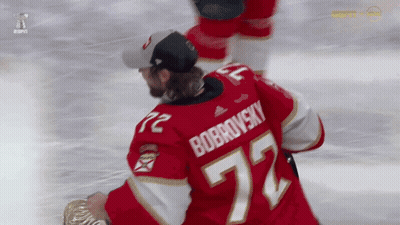 Hockey Player In Red Jersey Number 72 GIF
