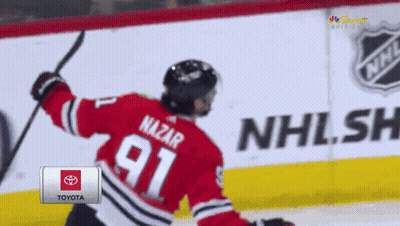 Hockey Player In Red Jersey Number 91 GIF