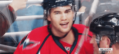 Hockey Player In Red Jersey Smiling And Talking GIF
