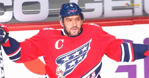 Hockey Player In Red Jersey With C GIF