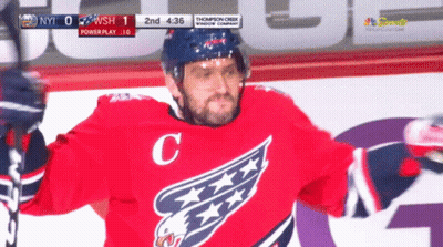 Hockey Player In Red Jersey With C GIF