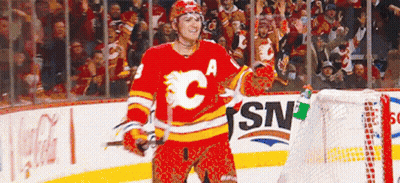 Hockey Player In Red Jersey With C GIF