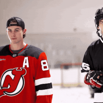 Hockey Player In Red Jersey With Letter A GIF