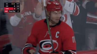 Hockey Player In Red Jersey With Letter C GIF