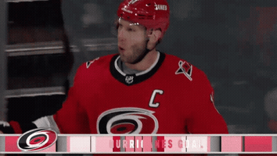 Hockey Player In Red Jersey With Letter C GIF