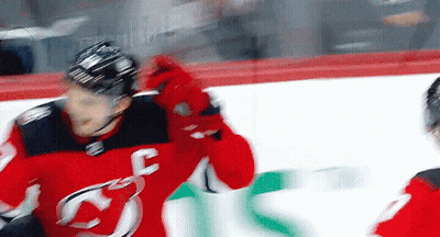 Hockey Player In Red Jersey With Letter F On Ice GIF