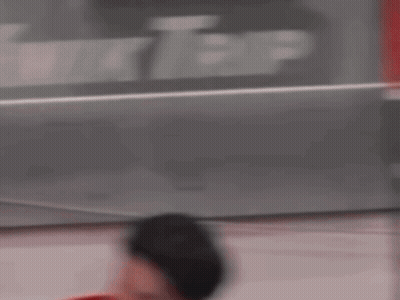 Hockey Player In Red Jersey With W On Helmet GIF