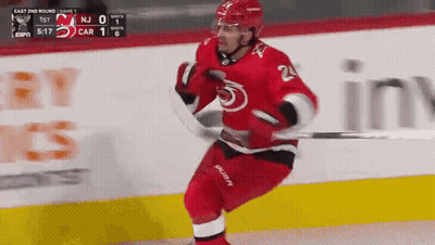 Hockey Player In Red Uniform Number 24 GIF