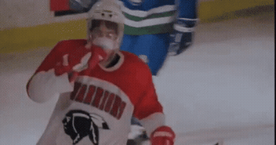 Hockey Player In Red Warriors Jersey On Ice GIF