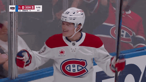 Hockey Player In Red White And Blue Jersey Number 13 On Helmet GIF