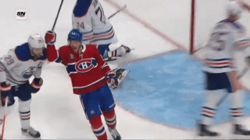 Hockey Player In Red White And Blue Jersey With H GIF