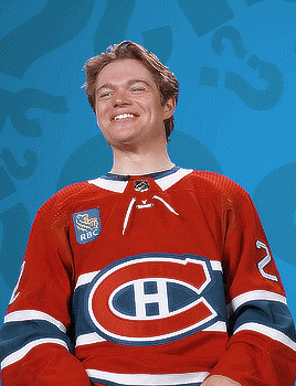Hockey Player In Red White And Blue Jersey With Letter H GIF