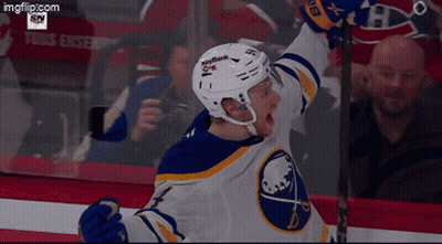 Hockey Player In Sabres Jersey Celebrates Goal GIF
