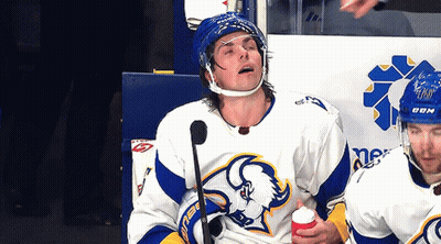 Hockey Player In Sabres Jersey Holding Cup GIF