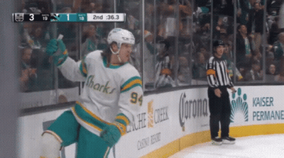 Hockey Player In Sharks Jersey Celebrates Goal GIF