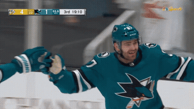 Hockey Player In Sharks Jersey Celebrates With Teammates GIF