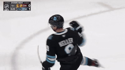 Hockey Player In Utah Jersey Holding Stick GIF