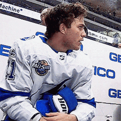 Hockey Player In White And Blue Uniform GIF