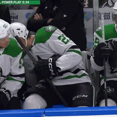 Hockey Player In White And Green Jersey Number 5 GIF