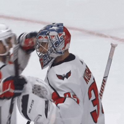 Hockey Player In White Jersey Number 23 GIF