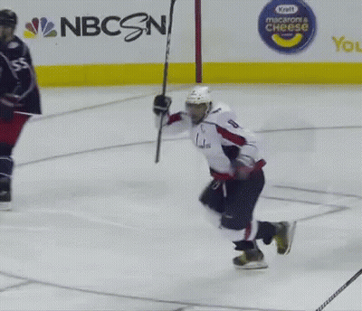 Hockey Player In White Jersey Number 8 Holding Stick GIF