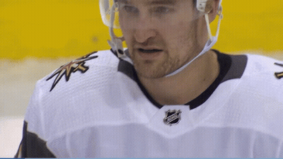 Hockey Player in White NHL Jersey