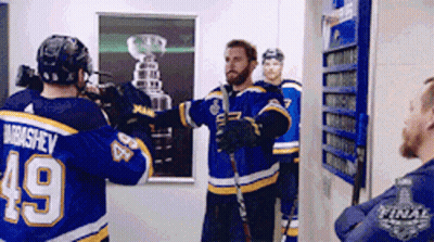Hockey Player In Yellow And Blue Uniform Number 85 GIF