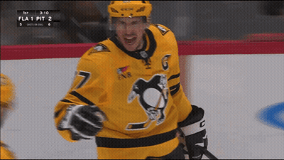 Hockey Player In Yellow Jersey Number 7 GIF