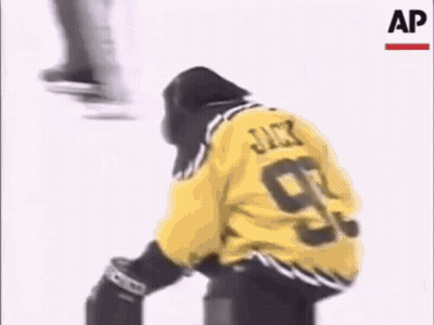 Hockey Player In Yellow Jersey Number 99 GIF