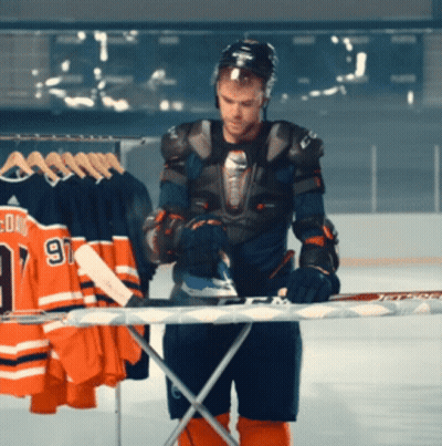 Hockey Player Ironing Stick Number 91 GIF