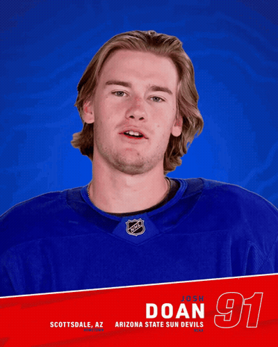 Hockey Player Josh Doan In Blue Shirt GIF