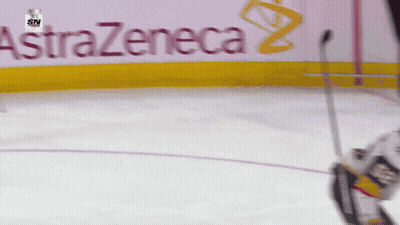Hockey Player Kicks Puck At AstraZeneca Ad GIF
