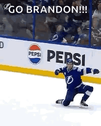 Hockey Player Kneeling On Ice In Front Of Pepsi Sign GIF
